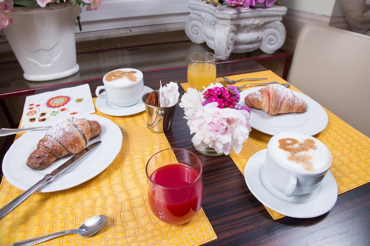 Caesar House Residenze Romane Couette-café Rome